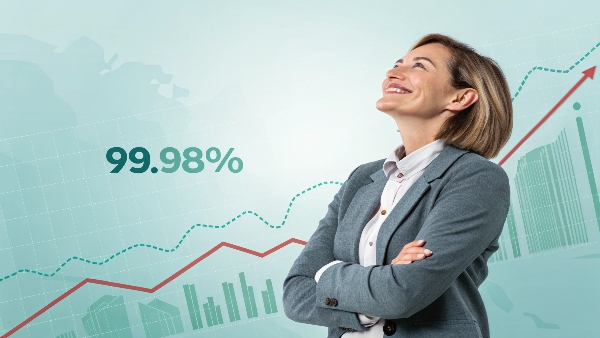 Business person looking relieved, with a graph showing stable uptime in the background