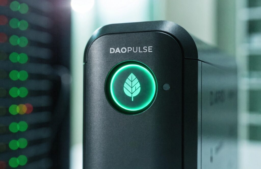 An image showing a green leaf icon inside a glowing power button on a DAOPULSE UPS